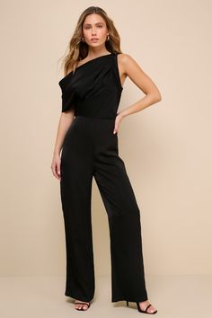 With your cute confidence and the Lulus Babe Energy Black Satin One-Shoulder Wide Leg Jumpsuit, you'll impress at any event! Sleek slightly stretchy woven satin shapes this impressive jumpsuit that has a one-shoulder neckline with one drapey, off-the-shoulder sleeve, paired with a wide, pleated strap with a trio of functional loop-button closures at the top. Blousy bodice finishes at a fitted waist, atop wide legs that end at ankle-length hems. Hidden zipper/clasp at side. Fit: This garment fits Formal Black Jumpsuit, Reunion Outfit, Casual Formal Dresses, Satin Jumpsuit, Lulu Fashion, Casual Wedding Dress, Your Cute, Adhesive Bra, Wide Legs