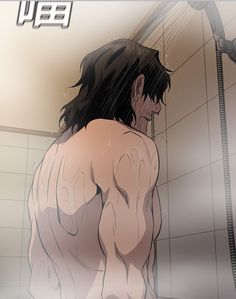 a man is standing in the shower with his shirt open and water running from his head