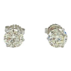 This is part of Chairish’s Fine Jewelry assortment.  Beautiful 3.02 ct. M VS1-VS2 (1.51 + 1.51) white diamond rounds.  Handmade in 18k white gold, 4 prong, push back, martini setting.  GIA certificates included. Luxury Platinum Diamond Earrings With Brilliant Cut, Luxury Round Platinum Diamond Earrings, Classic White Diamond Earrings With Single Cut Diamonds, Classic Platinum Diamond Earrings With Single Cut Diamonds, Classic White Diamond Earrings With Single Cut, Luxury Platinum Diamond Earrings, Classic Platinum Diamond Earrings With Brilliant Cut, Classic Platinum Brilliant Cut Diamond Earrings, Timeless Platinum Diamond White Earrings