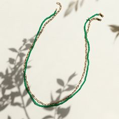 Emerald Necklace– GRACE LEE Gold Emerald Necklace With Green Onyx Round Beads, Elegant Single Strand Green Emerald Necklace, Classic Green Gemstone Beads Necklace, Gold Single Strand Emerald Necklace, Gold Emerald Single Strand Necklace, Elegant Single Strand Green Onyx Necklace, Classic Green Single Strand Necklace, Elegant Emerald Beaded Necklaces, Elegant Green Beaded Chain Necklace