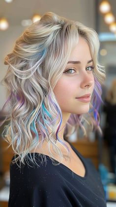 25 Trendy Silver Hair Color Ideas for a Radiant Look Pastel Hair Colors With Blonde Lavender, Blond Hair With Fun Colors, White Hair With Color Streaks, Blond Hair With Purple Underneath, Oil Slick Hair Color Blonde, White Hair With Colored Tips, Pastel Hair Color Ideas For Short Hair, Blonde Hair Pastel Highlights, Blonde Hair Peekaboo Color