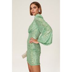 Light green sequins (100% Polyester). Sheath. V-neck. Long sleeves. Back zipper clousre. 32.5" from shoulder to hemline. Imported. Green Sequin Bodycon Dress For Party Season, Green Sequined Bodycon Dress, Glamorous Green Sequined Bodycon Dress, Green Sequin Bodycon Cocktail Dress, Glamorous Green Mini Bodycon Dress, Glamorous Green Bodycon Dress For Party Season, Fitted Green Sequined Bodycon Dress, Green Sequin Bodycon Mini Dress, Glamorous Green Mini Dress With Contrast Sequin