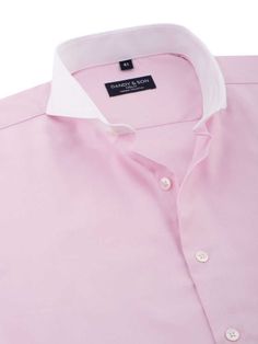 Introducing our Extreme Cutaway Pink Premium Contrast Shirt, featuring a contrasting white collar and cuffs and accented with Mother of Pearl buttons. The shirt is tailored to perfection with a cutaway collar, French cuffs, and a tailored fit for a modern and sophisticated look. Made with our best fabric yet, this shirt has a subtle striped weave, a high yarn count, and is both soft and durable. The pink fabric is made from 100% Premium Cotton (80/2*40), which makes it easy to iron and care for. Cutaway Collar, Iron Shirt, Scandinavian Fashion, French Cuff, Looking Dapper, Pearl Buttons, Mother Of Pearl Buttons, Pink Fabric, White Collar