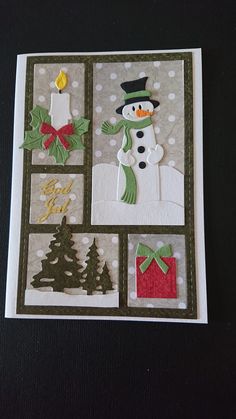 a card with snowmen and christmas decorations