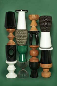 a bunch of different colored vases and lamps on a green background with the caption instagram