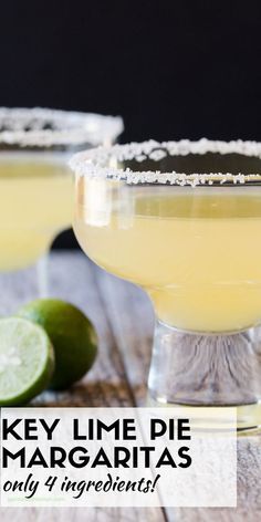 key lime margaritas in coupe glasses with salt on the rim and garnish