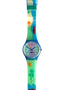 Vacation feeling comes with the Swatch Gent HOOKIPA. It is characterized by its great, maritime design. The colorful plastic strap of the watch shows the sea with many fish and the beach with palm trees. The classic dates back to 1992. The watch is water resistant and has a precision quartz movement with battery. This Swatch GN118 comes new and unworn with a new battery installed in its original case and its original papers. General remark on vintage Swatches: please be aware that the Swatch wat Cheap Vintage Digital Watch With Stopwatch, Cheap Multicolor Watches As Gifts, Unique Face Watch, Retro Watches Shark, Casual Cheap Multicolor Watches, Cheap Multicolor Analog Watches, 80s Swatch Watches, Swimmers Watch, Swimming Watches