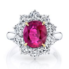 The allure of red exudes from this 4.09ct H GIA Certified Oval Ruby, adorned by 10 Round diamonds at 1.70ct sitting on a Platinum shank with 18K Yellow Gold prongs. At a total carat weight of 5.79ct, this elegant rings needs no further introduction. Red Brilliant Cut Diamond Ring In Platinum, Red Diamond Ring With Brilliant Cut In Platinum, Red Brilliant Cut Platinum Diamond Ring, Red Platinum Diamond Ring With Brilliant Cut, Exquisite Red Diamond Ring With Brilliant Cut, Red Diamond Ring With Halo Setting In Platinum, Red Ruby Ring With Halo Setting In Platinum, Dazzling Red Diamond Ring With Brilliant Cut, Luxury Red Diamond Ring With Halo Design