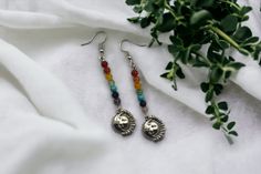 ✦ INFORMATION ✦ You will receive 1 pair of sun and moon charm earrings with chakra beads. The drop length is 70 mm.  Stones used: Amethyst Lapis Lazuli Blue Howlite Aventurine Yellow Jade Orange Jade Red Jade ✦ CUSTOM ORDER ✦ Would you like another length, charm, color or something totally else? No problem! Just message me with all of your wishes and we will work it out. ✦ SHIPPING & PACKAGING ✦ The items will be send 1-5 days after payment. The package will be send from the Netherlands. The ite Chakra Earrings, Real Pearl Jewellery, Lapis Lazuli Blue, Blue Howlite, Chakra Beads, Gemstone Drop Earrings, Red Jade, Silver Pearl Earrings, Beads Charm