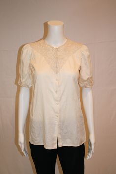 "Hanae Mori amazing ecru blouse with sleeves and top embellished with an embroidered lace.  Vintage late 70s 100% cotton Snap and button front Size: tag is an 11 (fits more like a small/medium) Measures laying flat: 17\" armpit to armpit, 25\" shoulder to hem Condition: Very Good Vintage Condition" Blouse With Sleeves, White Nightgown, Hanae Mori, Lace Vintage, Embellished Blouse, Vintage Gowns, Beautiful Handbags, Red Blazer, Vintage Yellow