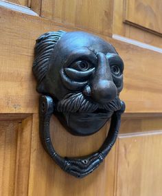 a door handle with a face on it