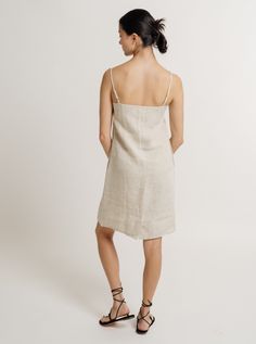 Elevate your style with our mini dress—a chic and versatile piece that features a square neckline, adjustable straps for the perfect fit, and a vent at the back for ease of movement. Completing the look is a practical side zip, ensuring both style and convenience for any occasion. Made with organic linenLined with organic cottonHandmade in IndiaMachine wash cold on delicate cycle, lay flat to dry, warm iron as needed Honoring Earth + Maker Each of our wovens are handcrafted in India, preserving Linen Midi Dress, Linen Mini Dress, Indian Textiles, Square Necklines, Natural Linen, Square Neckline, Lay Flat, Side Zip, Adjustable Straps