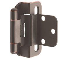 an image of a door hinge with two holes on the front and one hole on the back