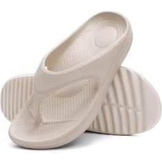 Dive into a realm of comfort and practicality with these Contoured Comfort Flip Flops. They're not just a stylish addition to your summer footwear but also offer a supportive experience with every step. Designed with a focus on comfort and durability, they will be your go-to choice for beach days, backyard barbecues, or simply repose at home. Features: Size: These flip flops come in a range of sizes to ensure a proper fit for various foot dimensions. Material: Made with a durable synthetic mater Comfortable Slip-resistant Sport Sandals With Round Toe, Lightweight Synthetic Round Toe Slippers, Slip-resistant Eva Sandals, Non-slip Comfortable Synthetic Sport Sandals, Comfortable Non-slip Synthetic Sport Sandals, Comfortable Flip Flops With Arch Support And Round Toe, Comfortable Slip-resistant Sport Sandals, Comfortable Sport Sandals With Round Toe, Comfortable Arch Support Flip Flops With Round Toe