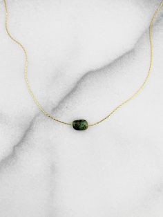 "This unique crystal necklace is carefully handcrafted with a natural emerald gemstone on specialty beading chain. It comes in 14k gold filled or sterling silver finish. The necklace comes with an extender and is adjustable up to 2\". M A T E R I A L S * & * S I Z E *Pendant size is 8-10mm *Natural Gemstones *Necklace is adjustable  *Material is 14k gold filled or sterling silver  How To Order: 1. Select your material. 2. Select your size; choose from: 14\"-16\" 16\"-18\" 18\"-20\" P R O D U C T Layering Jewelry, Chic Bracelet, Stone Crystal, Layered Jewelry, Rough Gemstone, Long Pendant, Holiday Shopping, Emerald Gemstone, Metal Finishes