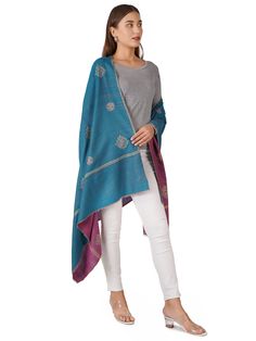 Indulge in the exquisite charm of our Handcrafted Pashmina Shawl, featuring a stunning double-faced design in captivating purple and blue hues. This luxurious shawl is a perfect blend of elegance and versatility, ideal for any stylish wardrobe. Product Details: Handcrafted from Pure Kashmiri Pashmina Material: Pure Pashmina (100% Cashmere) Size: 100 cm X 203 cm / 40 Inch X 80 Inch / 1.1 x 2.2 Yards (Approx) Colors: Double-faced with Purple on one side and Blue on the other Craftsmanship: Handwov Blue Traditional Shawl With Zari Work, Traditional Blue Scarf For Festive Occasions, Traditional Blue Scarves For Festive Occasions, Fusion Style Traditional Drape Dupatta For Eid, Traditional Drape Pashmina Shawl With Cutdana, Blue Shawl With Zari Work In Traditional Drape, Blue Traditional Scarves For Festive Season, Blue Traditional Drape Shawl For Festive Occasions, Festive Blue Shawl With Traditional Drape