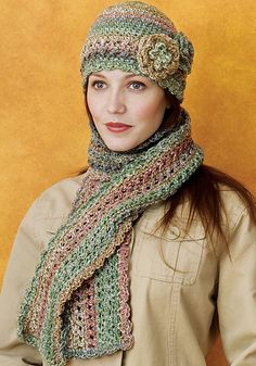 a woman wearing a knitted hat and scarf