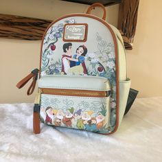 -Authentic, Brand New With Tags Loungefly Disney Snow White The Prince And The Seven Dwarfs Mini Backpack -You Will Receive The Exact Bag Pictured. -Super Cute, A Great Collectible For Pokemon Fans. -Comes From A Smoke Free, Pet Free Home. -I Ship Within 1-2 Days From Purchase. -Please Request For More Photos If Needed. -Check Out My Other Items! Bundle For A Discount. White Backpack For Disney Trips, White Disney Travel Backpack, Snow White And Prince, Disney Princess Backpack, Loungefly Purse, Princess Backpack, Disney Princess Cosplay, Disney Now, Disney Loungefly