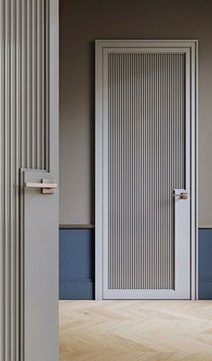 an open door in a room with wooden floors