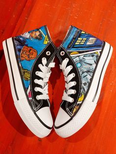 Fantastic Licensed Doctor Who Baddies Monsters Logo Cartoon Fabric hand decorated converse style shoes.  Great for Doctor Who enthusiasts.  This is not a licensed Dr Who Product. It is however, handcrafted from licensed Dr Who fabric purchased from a licensed supplier. I am not affiliated with or sponsored by Dr Who. My prices reflect the cost of the shoes and my time to apply the fabric.  I do not charge for the fabric. Choices are for 2 sides of the shoe customised, (outsides only), or for 4 s Custom Artwork High-top Sneakers With White Sole, Custom High-top Sneakers With Rubber Sole, High-top Sneakers With Custom Artwork And White Sole, High-top Sneakers With Custom Artwork For Streetwear, Custom-designed High-top Sneakers For Streetwear, Casual Hand Painted High-top Sneakers, White High-top Sneakers With Custom Artwork, Themed White Low-top Sneakers, Decorated Converse