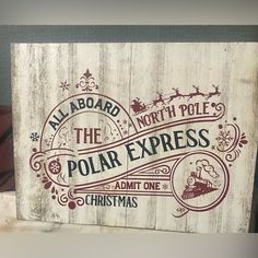 a wooden sign that says the polar express on it