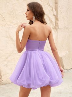 Product Code: FSWD1104 Embellishment: Mesh,Satin Fabric: 100% Polyester Back Style: Zipper Up Fully Lined: Yes Built-in Bra: Yes Available Color: Violet Stretch: Moderate Fits true to size Imported Model Information: Height: 5' 2" Bust: 33.5'' Waist: 24“ Hips: 35.5” wearing US size Small Short Graduation Dresses, Tube Dress, Purple Fashion, Glamorous Evening Gowns, Flowing Maxi Dress, Homecoming Dresses, Graduation Dress, Fit And Flare, Perfect Dress