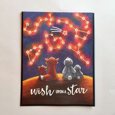 a painting on the wall that says wish upon a star with two stuffed animals sitting next to each other