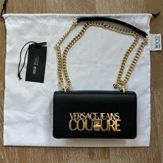 Can Only Be Found In Europe Authentic Versace Bag! Only Worn A Handful Of Times And Is In Excellent Condition. Authentication Tag Included Black Versace Bag, Evening Rectangular Bag With Logo, Designer Shoulder Bag With Logo For Evening, Gold Shoulder Bag With Logo For Evening, Designer Evening Shoulder Bag With Logo, Rectangular Evening Bag With Logo, Elegant Bags With Logo, Gold Evening Shoulder Bag With Logo, Elegant Gold Shoulder Bag With Logo