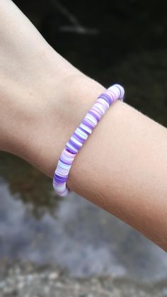 This super cute clay bead bracelet is made with high quality beads. It has a randomized pattern with the colors: -dark purple -light purple -white.  Please note that colors and pattern may vary from each bracelet. All bracelets vary from 6.5 inches to 6.75 inches.  While the string I use is high quality, be careful not to overstretch the bracelet as it will shorten its lifespan. In addition, keep out of water as it will shorten the lifespan of the bracelet. Excessive sweating and water exposure may also rust any gold beads if there are any gold beads on the bracelet.  WARNING: keep out of reach of children as this product is a choking hazard. Purple Polymer Clay Bead Bracelet, Purple Clay Bead Bracelet, Clay Bead Bracelets, Clay Bead Bracelet, Excessive Sweating, Clay Bead, Cute Clay, Purple Light, Free Bracelet