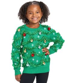 For the days before they’re ready to take on decking out their entire room, we bring you insanely decked out Christmas sweaters. There’s a whole lot less surface area, and a whole lot less work - behold! The Girl's Gaudy Garland Ugly Christmas Sweater. This one’s even better than bedroom decor – it’s decor you can wear anywhere. Kids Ugly Christmas Sweater, Family Christmas Sweaters, Funny Ugly Christmas Sweater, Ugly Christmas Sweater Vest, Kids Christmas Sweaters, Christmas Sweater Vest, Tipsy Elves, Tree Sweater, Girls Christmas Outfits