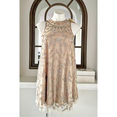 Altar’s State Beaded A-Line Mini Dress Intricate Art Deco Beading Defines This Glamorous Dress. Details: - Size Xs - Color Nude - Style # R1521-31h0-39 - Mesh With Beads And Sequin Embellishments - Roundneck - Sleeveless - Zipper W/ Hook And Eye Closure - Fully Lined - Raw Unfinished Hem New With Tag, Retail $149.95 111 Glamorous Beaded Sleeveless Dress, Glamorous Sleeveless Beaded Dress, Embellished A-line Party Mini Dress, Glamorous Beaded Sequin Dress For Spring, Embellished A-line Mini Dress For Wedding, Embellished Sleeveless Dressy Dress, Dressy Embellished Mini Dress For Wedding, Dressy Embellished Sleeveless Dress, Glamorous Beaded Spring Dress