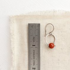 Cloche is French for 'bell'. Bright red jasper stones are suspended in unique pinned bails. Sweet and dainty. Measure 1". Handmade Shepherd hook earwires. Sterling silver, which has been oxidized and hand polished for an antique look. About Jasper: The name jasper comes from the Greek meaning "spotted stone". It can be spotted or striped depending on the foreign minerals included. Jasper is a microcrystalline variety of Quartz. It comes in many different colors and is found all over the world. J Unique Jasper Jewelry Gift, Red Jasper Jewelry With Natural Stones, Greek Meaning, Artisan Red Jasper Necklaces, Artisan Red Jasper Jewelry, La Cloche, Unique Jasper Pendant Jewelry, Red Jasper Stone, Shepherds Hook