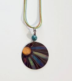 "This necklace  is made with copper and fire only!  I make it by painting patterns onto copper with a micro torch, and as the copper heats and cools it turns different colors naturally!  The copper circle 1 1/2\" and is shown on colorful silk cord which is adjustable.  Definitely a one of a kind piece!   These are custom made per order, so please remember - I have little control of what colors happen - your piece may not look exactly like the picture - it may be similar, it may be more vibrant, it may be a different color palette - but I assure you it will be cool!" Flame Painting, Painted Pendants, 7th Anniversary Gifts, 7th Anniversary, Painted Jewelry, Copper Style, Unusual Jewelry, Silk Cord, Copper Necklace