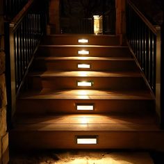 some steps lit up with lights in the dark