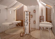 the interior of a spa room with white furniture