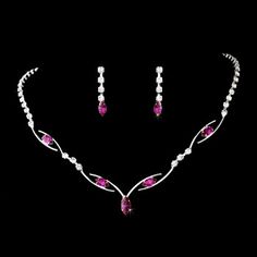 Fuchsia Jewelry for your Bridal PartyThis silver plated jewelry set sparkles with clear and fuchsia colored rhinestones in a unique design.Size: 17" (Necklace Length) 1" (Earrings Length).Color: Silver/Fuchsia.Style: 5104f.The drop earrings are for pierced ears.Price includes a white gift box - ready for gift giving!Please allow 1 week for delivery.Shipping Policy.Return Policy Fuchsia Necklace, Diy Jewelry Tutorials, Electroformed Jewelry, Fuchsia Color, Silver Plated Jewelry, Crochet Patterns For Beginners, White Gift Boxes, Craft Stick Crafts, Bridesmaid Jewelry