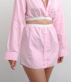 This Fiorella Set embraces style, comfort and sustainability. Crafted from upcycled mens shirt, the delicate soft pink hues and luxurious fabric create a lightweight yet cozy feel. Perfect for a special occasion, this set is sure to add a touch of sophistication to your wardrobe. Elastic waist on both top and bottom gives a bit more room for size variation. This garment is one of one and will not be seen again. I have cut up an original pre owned mens size dress shirt and gave it a feminine modern twist. Cut Up, Luxury Fabrics, Soft Pink, Special Occasion, Womens Skirt, Twist, Mens Shirts, Wardrobe, Clothes For Women