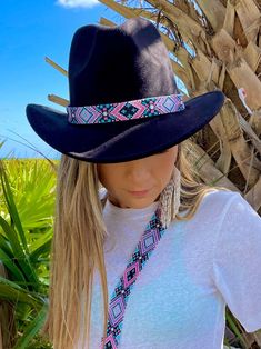 Embellish your favorite hat with beaded tribal patterns in a variety of delicious colors! All hat bands include adjustable leather cords so they hug perfectly on all sized hats! All hat bands measure approximately 1"W x 36"L. *Hat pictured not included Handmade in Guatemala  *Please note that all of our items are handcrafted and unique to each piece. Also, colors may vary slightly based on your device. Like what you see here? Check out all of our beautiful handmade products and follow us on Face Adjustable Brimmed Hats For Music Festival, Adjustable Multicolor Hat For Western-themed Events, Adjustable Western Hat For Music Festival, Traditional Handmade Black Hat Bands, Handmade Black Hat Bands For Festival, Handmade Bohemian Hat Bands For Western-themed Events, Bohemian Black Hat Band For Western-themed Events, Bohemian Black Hat For Western-themed Events, Traditional Black Hat Bands For Festival