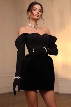 DESCRIPTION: Off shoulder design Long sleeve and sweetheart neckline A-line design Velvet Mini length Model is wearing size small. Product Measurements  Top Length  Waist  Sleeve  Bust   Label Size  US Size  IN  IN  IN  IN   XS  2  24.41  26.38  17.72  33.07   S  4  24.80  27.95  18.11  34.65   M  6  25.20  29.53  18.50  36.22   L  8 -10  25.59  31.89  18.90  38.58      Product Measurements  Top Length  Waist  Sleeve  Bust   Label Size  US Size  CM  CM  CM  CM   XS  2  62  67  45  84   S  4  63  71  46  88   M  6  64  75  47  92   L  8 -10  65  81  48  98 Elegant Dress With Sweetheart Neckline For Dinner, Elegant Dinner Dress With Sweetheart Neckline, Elegant Party Dress With Heart-shaped Neckline, Chic Evening Dress With Sweetheart Neckline For Banquet, Fitted Mini Dress With Sweetheart Neckline For Banquet, Elegant Dresses With Heart-shaped Neckline For Night Out, Elegant Off-shoulder Mini Dress With Fitted Bodice, Elegant Mini Dress With Sweetheart Neckline For Banquet, Elegant Mini Dress With Sweetheart Neckline For Dinner