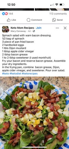 a salad with bacon, lettuce and cheese in it on a blue and white plate