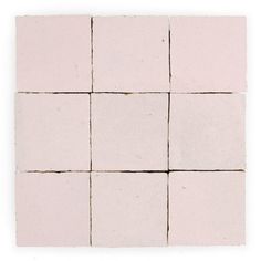 white square tiles arranged in rows on a white background