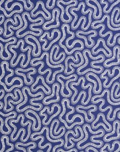 an abstract blue and white pattern on fabric