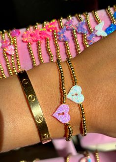 Stretchy heart lock bracelet with 18k gold plated beads Featuring Colorful Natalie logo charm Lock Bracelet, 18k Gold Bracelet, 18k Gold Necklace, Heart Lock, Pink Bracelet, Wholesale Beads, Gold Beads, Cute Jewelry, Accessories Bracelets