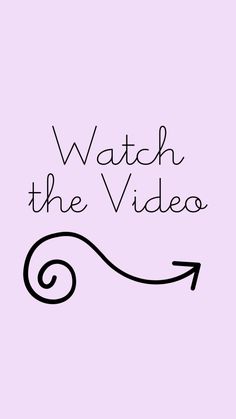 the words watch the video are written in black on a pink background with an arrow