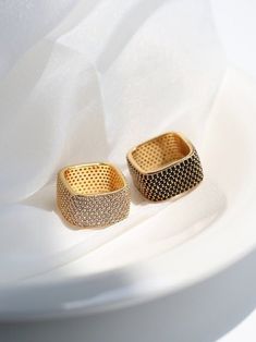 Make a dazzling statement with our Square Micropaved Zirconia Ring - a stunning accessory that combines modern elegance with timeless sophistication. Adorned with micropaved zirconia stones in a square design, it adds a touch of sparkle and sophistication to any outfit. Available in various sizes to ensure the perfect fit. Metal: 18K Recycled Gold Plated On Brass Gemstone: Cubic Zirconia Ring Height: 1.2cm Ring Sizes Available: US 6, 7, 8 Weight: 10.8g Baroque Pearls Necklace, Real Pearl Jewellery, Pearl Cluster Ring, Pearl Earring Set, 18k Gold Chain, Trendy Bracelets, Opal Ring Gold, Gemstone Beaded Necklace, Pearls Necklace