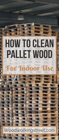 pallet wood for indoor use is stacked in a storage area with a sign that reads how to clean pallet wood for indoor use