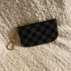 Checkered Coin Purse Features A Key Chain That Can Be Attached To Your Keys, Purse, Etc Black Zipper Pouch Coin Purse Clutch, Black Zipper Clutch Coin Purse, Black Rectangular Zipper Coin Purse, Black Rectangular Coin Purse With Zipper, Rectangular Black Coin Purse With Zipper, Black Zipper Coin Purse For Personal Use, Black Rectangular Coin Purse With Removable Pouch, Black Bags With Zipper Pouch For Gift, Rectangular Black Coin Purse With Removable Pouch