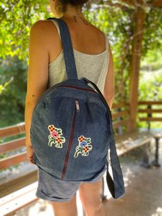 A lovely backpack for everyday use. Our collection includes a variety of designs to suit your style. Made out of denim. Not only eco-friendly but also fashionable, featuring trendy designs that will make you stand out. Approximate dimensions of the backpack: Width: 33 cm Height: 40 cm Handle: 75 cm This is 100% handmade that has variations of colours, texture. Small imperfections/differences in shape, size and colour can happen and are part of the charm of a handmade product. Please do not hesitate to contact me with your questions. Flowers, Cross Stitch, Denim Backpack, Large soft denim Backpack bag, Casual Backpack, Daily Backpack, Travel Backpack, School Backpack, Laptop Bag, Notebook Bag Summer Backpack With Pockets For Daily Use, Summer Backpack For Daily Use With Pockets, Everyday Summer Backpack With Pockets, Summer Daily Use Backpack With Pockets, Summer Backpack With Pockets For Everyday Use, Casual Backpack Perfect As A Gift, Casual Rectangular Backpack As Gift, Trendy Embroidered Backpack For Travel, Casual Handmade Rectangular Backpack