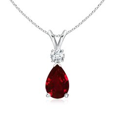 This classic solitaire pendant features a pear-shaped ruby secured in a prong setting. A brilliant round diamond sits atop the purplish red gemstone. Simple yet alluring, this ruby pendant in 14k white gold is crafted with a lustrous v-bale. Necklaces Collection, Necklaces Simple, Solitaire Pendant Necklace, Jewelry Cabinet, Jewelry Appraisal, Ruby Pendant, Ruby Jewelry, Teardrop Pendant, Necklaces Jewelry