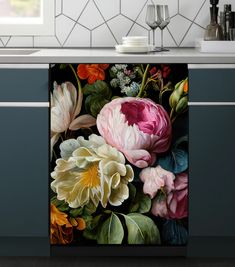 an image of a kitchen scene with flowers on the cabinet door and counter top in the background